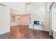 Spacious living room featuring hardwood floors, staircase, and contemporary decor at 9305 E Canyon View Rd, Scottsdale, AZ 85255
