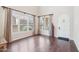 Bright living room with hardwood floors, large windows, and elegant drapery at 9305 E Canyon View Rd, Scottsdale, AZ 85255