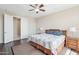 The main bedroom features a ceiling fan and window with curtains at 9305 E Canyon View Rd, Scottsdale, AZ 85255