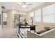 Home office featuring built-in shelving, a modern desk, and abundant natural light, and a ceiling fan at 9305 E Canyon View Rd, Scottsdale, AZ 85255