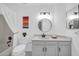 Clean bathroom with a single vanity and bathtub shower at 9544 W Sierra Pinta Dr, Peoria, AZ 85382