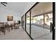 Dining area with sliding glass doors leading to the backyard at 9544 W Sierra Pinta Dr, Peoria, AZ 85382