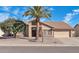 Single story home with tile roof and desert landscaping at 9544 W Sierra Pinta Dr, Peoria, AZ 85382