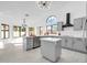 Modern kitchen with island and stainless steel appliances at 9544 W Sierra Pinta Dr, Peoria, AZ 85382
