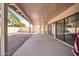 Covered patio with concrete flooring and access to backyard at 9544 W Sierra Pinta Dr, Peoria, AZ 85382