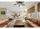 Open concept living room with view of kitchen and breakfast nook at 9606 S 23Rd Dr, Phoenix, AZ 85041