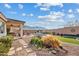 Stone pathway leads to a relaxing pool and patio area at 9606 S 23Rd Dr, Phoenix, AZ 85041