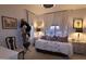 Cozy bedroom featuring a daybed and window seating at 11500 E Cochise Dr # 2070, Scottsdale, AZ 85259