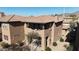 Two story home with balcony and desert landscaping at 11500 E Cochise Dr # 2070, Scottsdale, AZ 85259