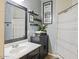 Cozy bathroom with a vanity, a well-lit mirror, and a shower at 126 E Key West Dr, Casa Grande, AZ 85122