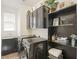 Organized laundry room with modern appliances and ample storage solutions at 126 E Key West Dr, Casa Grande, AZ 85122