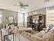 Comfortable living area with a media center and a cozy sectional sofa at 126 E Key West Dr, Casa Grande, AZ 85122