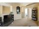 Inviting living room with neutral tones, display niche, and access to other rooms at 126 E Key West Dr, Casa Grande, AZ 85122