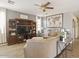 Bright living area with a media center and a comfortable sectional sofa at 126 E Key West Dr, Casa Grande, AZ 85122