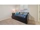 Small bedroom with daybed and colorful pillows at 15402 S 17Th Ct, Phoenix, AZ 85045