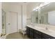 Main bathroom with double vanity and toilet at 15877 W Diamond St, Goodyear, AZ 85338