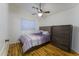 Bedroom with wood flooring and ceiling fan at 15877 W Diamond St, Goodyear, AZ 85338