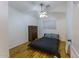 Bright bedroom with wood flooring and ceiling fan at 15877 W Diamond St, Goodyear, AZ 85338