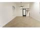 Bright dining room with tile floors and barn door at 15877 W Diamond St, Goodyear, AZ 85338