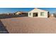 Large backyard with gravel and a house in the background at 1673 E Jardin Pl, Casa Grande, AZ 85122