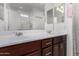 Double vanity bathroom with walk-in shower at 1673 E Jardin Pl, Casa Grande, AZ 85122