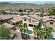 Aerial view of the home with mature palm trees and a private backyard pool at 1801 W Nighthawk Way, Phoenix, AZ 85045