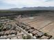An aerial view shows the community's homes and the surrounding desert landscape at 1801 W Nighthawk Way, Phoenix, AZ 85045