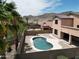 Backyard featuring an in-ground pool, desert landscaping, and mountain views at 1801 W Nighthawk Way, Phoenix, AZ 85045
