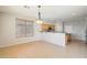 Bright dining area with tile floors, pendant lighting, and open access to the kitchen at 1801 W Nighthawk Way, Phoenix, AZ 85045