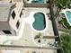 Aerial view of backyard featuring pool with patio and desert landscaping at 1801 W Nighthawk Way, Phoenix, AZ 85045