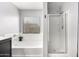 Bathroom with soaking tub, shower stall, and vanity at 18320 N Betty Ct, Maricopa, AZ 85138