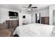 Main bedroom with king-size bed and ensuite bathroom access at 18320 N Betty Ct, Maricopa, AZ 85138