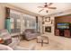 Comfortable living room featuring a fireplace and ample natural light at 20750 N 87Th St # 1065, Scottsdale, AZ 85255