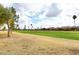 Community view of homes and lush golf course at 2329 N Recker Rd # 23, Mesa, AZ 85215