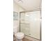 Bathroom featuring a large shower and updated flooring at 2329 N Recker Rd # 23, Mesa, AZ 85215