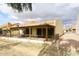 Rear view showing patio, covered porch and landscaping at 2329 N Recker Rd # 23, Mesa, AZ 85215