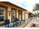 Front view of a light brown stucco house with a two-car garage at 2329 N Recker Rd # 23, Mesa, AZ 85215