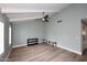 Bright living room with wood-look floors and a ceiling fan at 2329 N Recker Rd # 23, Mesa, AZ 85215