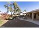Relaxing backyard patio with seating area and desert landscaping at 23610 S Desert Moon Ct, Sun Lakes, AZ 85248