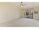 Bedroom with sliding glass doors leading to backyard at 23610 S Desert Moon Ct, Sun Lakes, AZ 85248