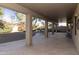 Covered patio with tile flooring, offering shade and comfort at 23610 S Desert Moon Ct, Sun Lakes, AZ 85248