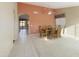 Dining area with wood table and chairs, adjacent to kitchen at 23610 S Desert Moon Ct, Sun Lakes, AZ 85248