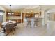 Bright kitchen with wood cabinets and granite countertops at 23610 S Desert Moon Ct, Sun Lakes, AZ 85248