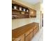 Kitchen with wood cabinets, granite counters, and stainless steel appliances at 23610 S Desert Moon Ct, Sun Lakes, AZ 85248