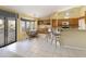 Kitchen with breakfast nook and access to backyard patio at 23610 S Desert Moon Ct, Sun Lakes, AZ 85248