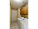 Laundry room with washer, dryer, and built-in cabinets at 23610 S Desert Moon Ct, Sun Lakes, AZ 85248
