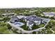 Aerial view showcases a luxurious home with a pool, playground, and large backyard at 25582 N 89Th St, Scottsdale, AZ 85255