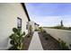 Landscaped backyard with brick pathway and desert plants at 25582 N 89Th St, Scottsdale, AZ 85255