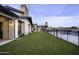 Landscaped backyard featuring artificial turf at 25582 N 89Th St, Scottsdale, AZ 85255