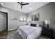 Light and airy bedroom with queen bed and access to closet at 25582 N 89Th St, Scottsdale, AZ 85255
